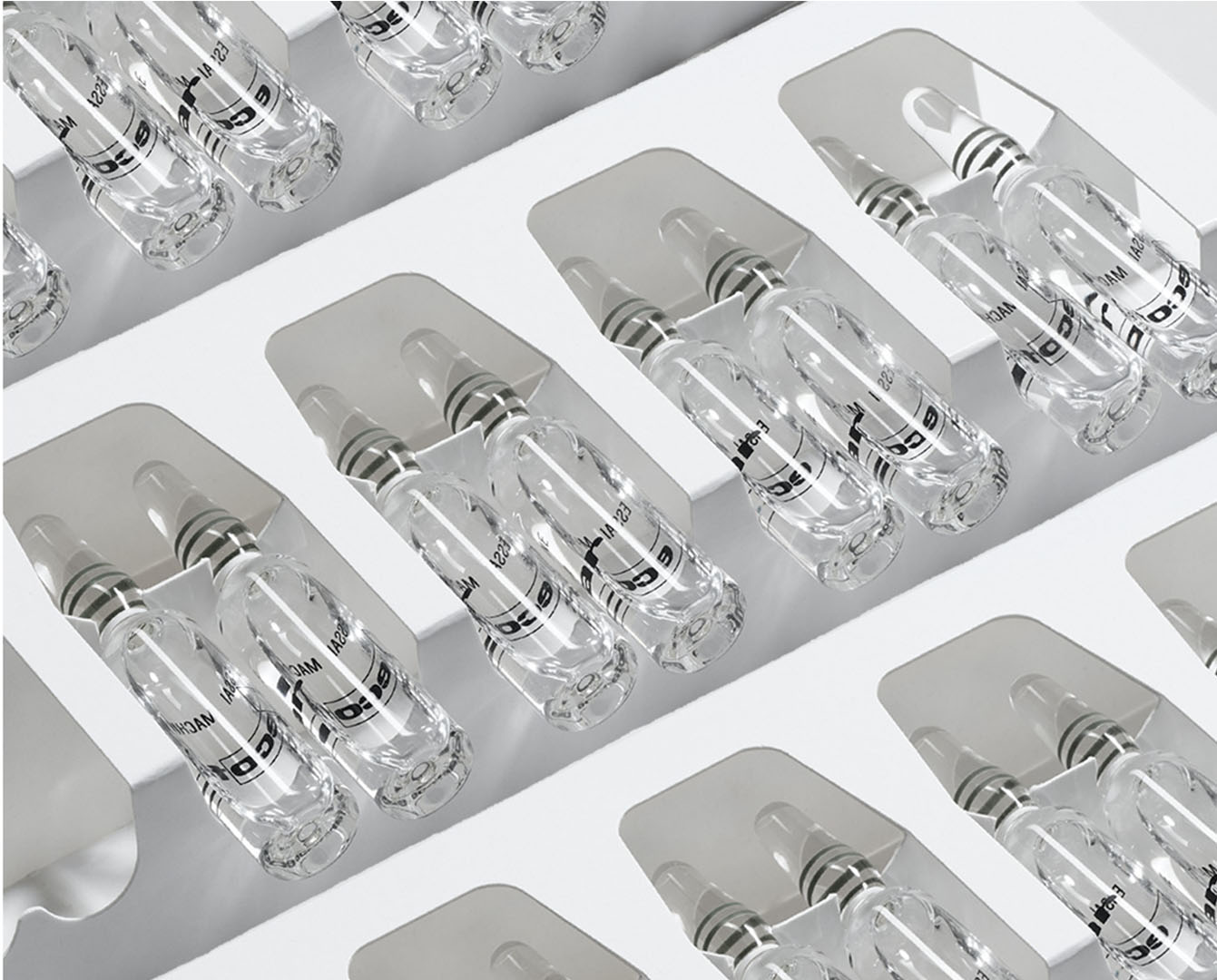 Package with several sets of new empty ampoules