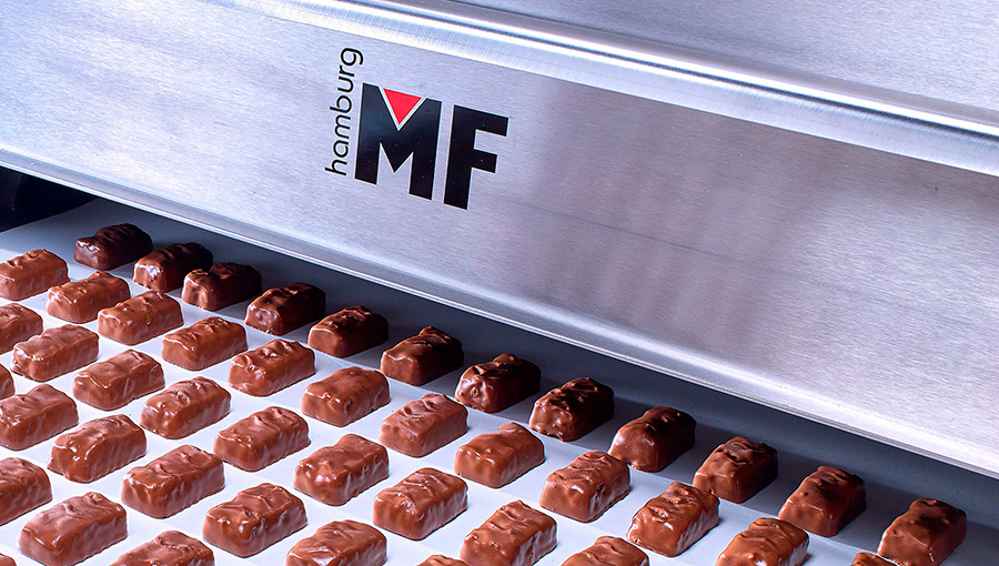Enrobing food and confectionery with chocolate is one of MF-Hamburg's core competencies.